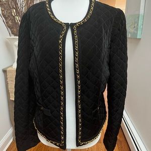 Black quilted Chicos jacket with gold chain trim